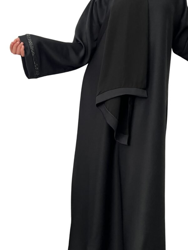 Closed plain black abaya in Dubai zoom material